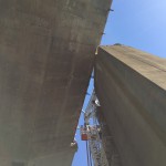 The new Bay Bridge comes within inches of pier E1 (on left) of the old bridge.